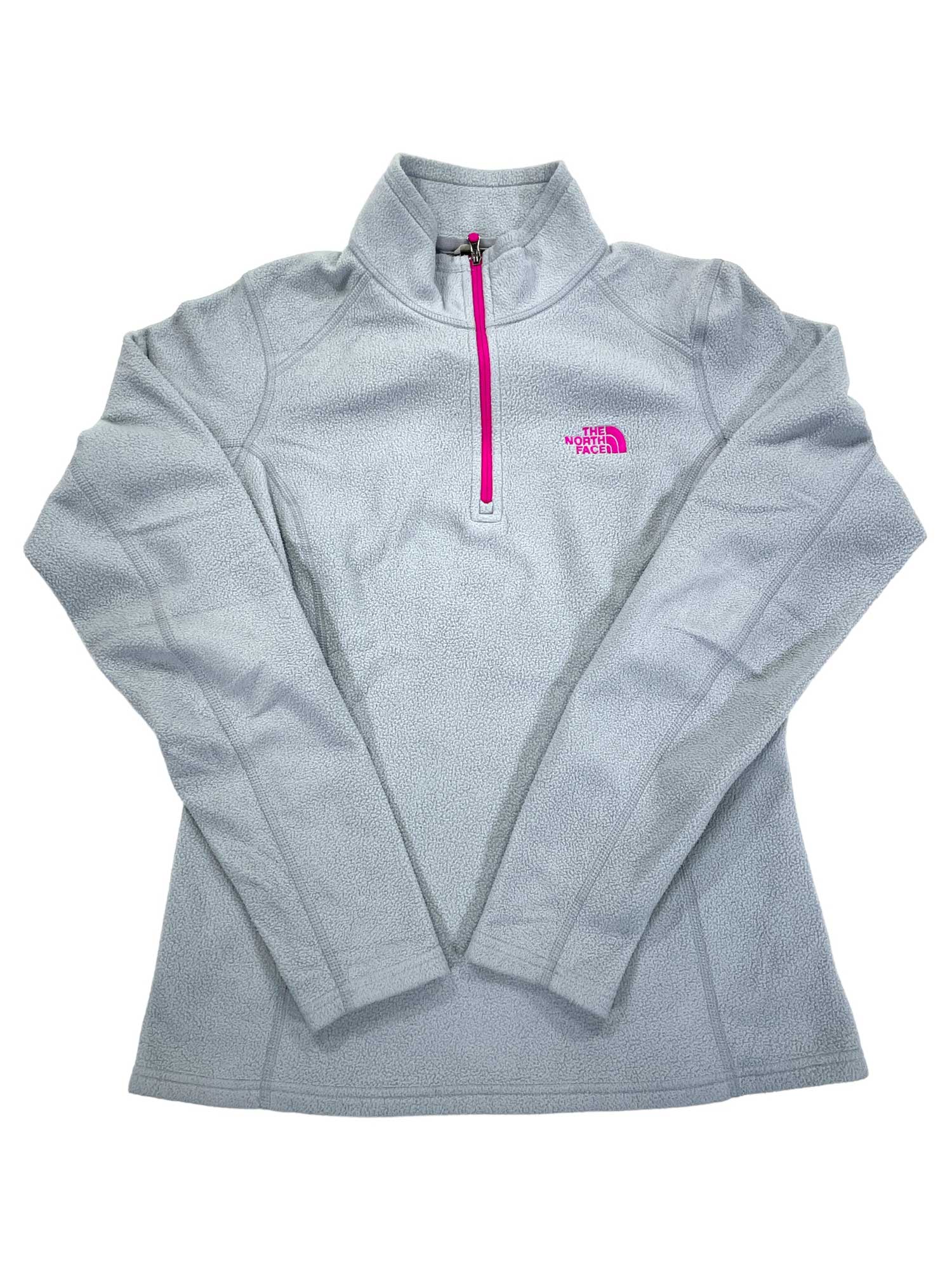 The Glacier 1/4 Zip Fleece is a light gray women's pullover featuring a bright pink zipper and logo on the chest. Shown laid flat on white, this versatile layer works as a lightweight jacket for any season.