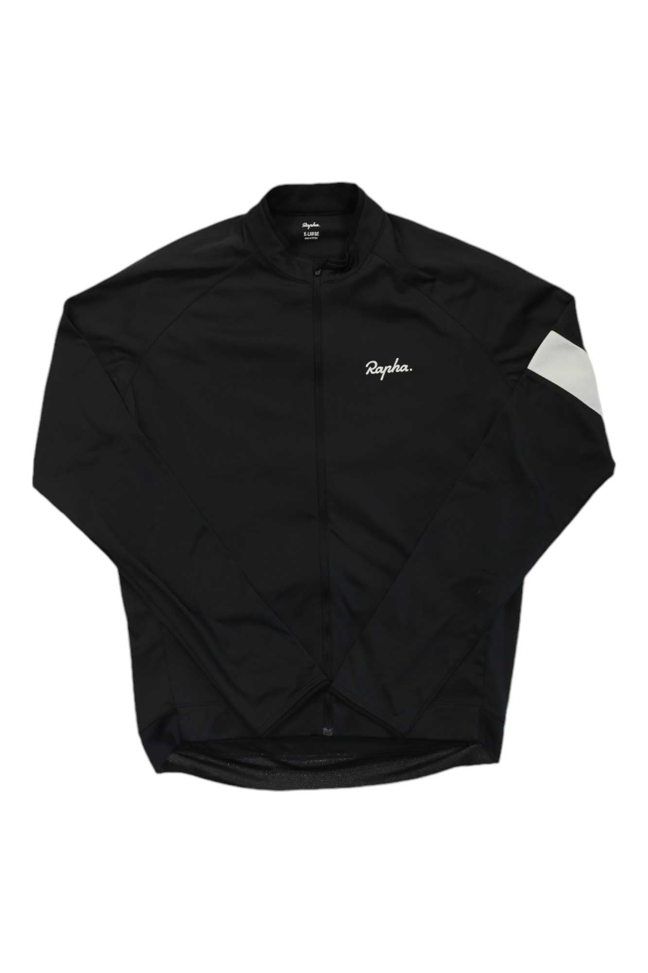 The Rapha Mens Core Long Sleeve Jersey in black features a white chest logo and a single white stripe on the left sleeve. Made from moisture-wicking fabric, it is shown laid flat on a white background.