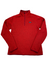 The Womens Better Sweater 1/4-Zip is a bright red, hip-length, sweater-knit fleece pullover with long sleeves, stand-up collar, zippered security pocket, and a small rectangular logo patch on the left chest. Shown laid flat on white background.
