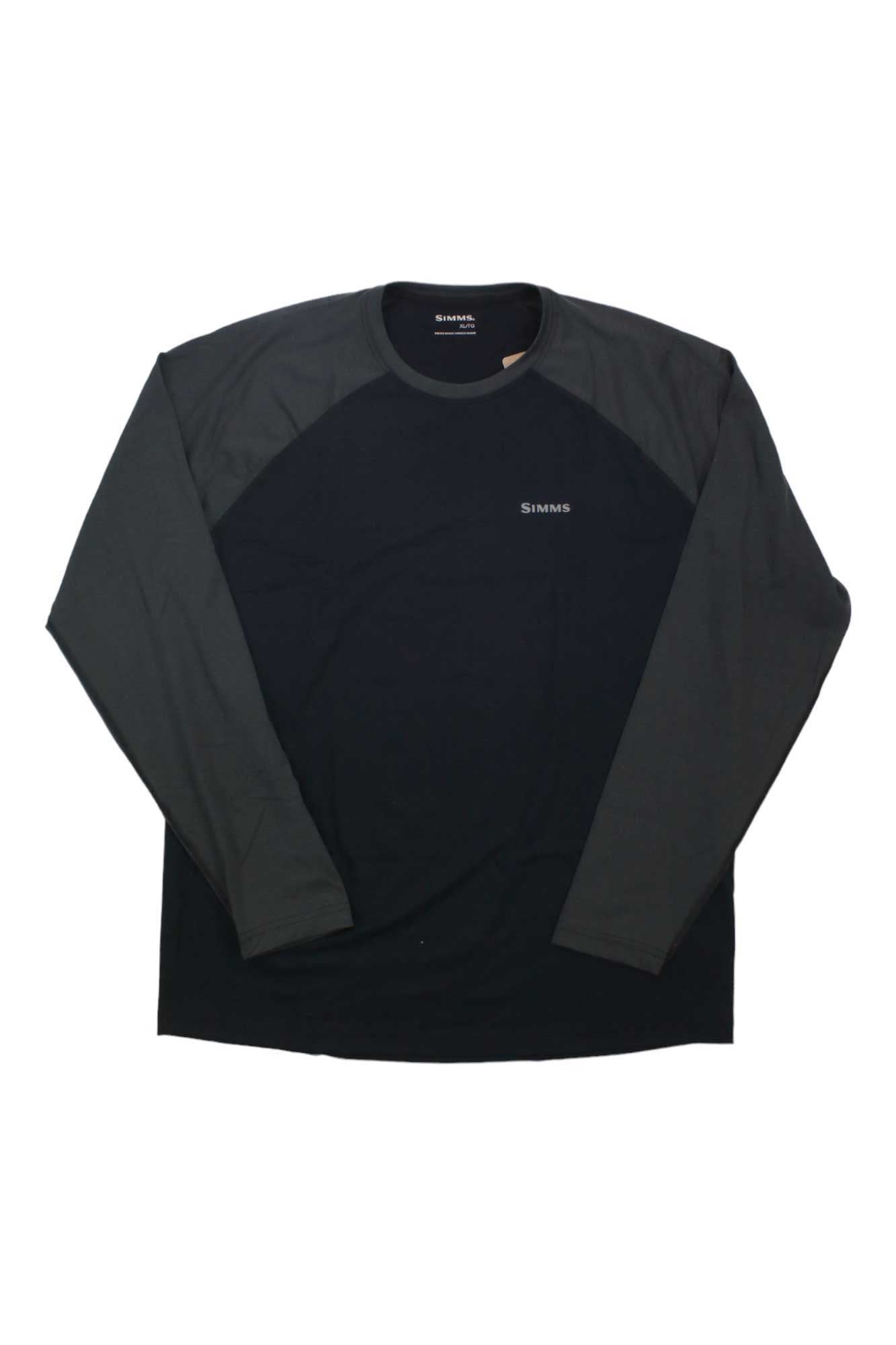 The Simms Men's Lightweight Baselayer Top features dark gray sleeves, a black body, and the Simms logo on the left chest. This men's fishing shirt offers moisture-wicking performance for all-day comfort.