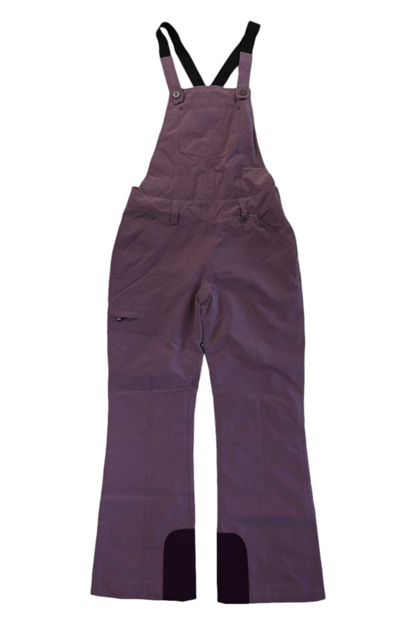 The Obermeyer Womens Malta Overalls Bib features purple waterproof fabric, black adjustable shoulder straps, wide legs, front and zippered side pockets, plus reinforced black bottoms—perfect insulated ski bibs for women. Laid flat on a white background.