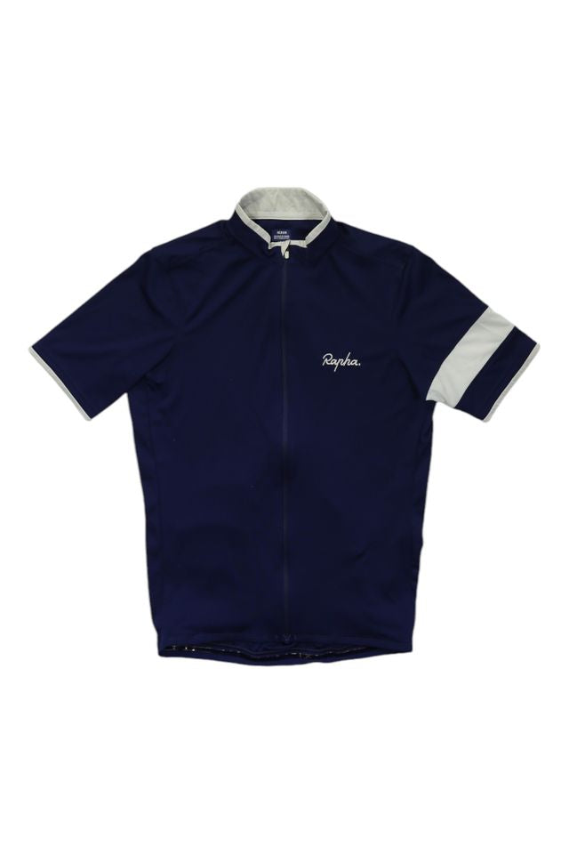 The Rapha Mens Super Lightweight Jersey is navy blue with short sleeves, a white collar, a white stripe on the left sleeve, front zipper, and "Rapha" embroidered in white on the left chest.