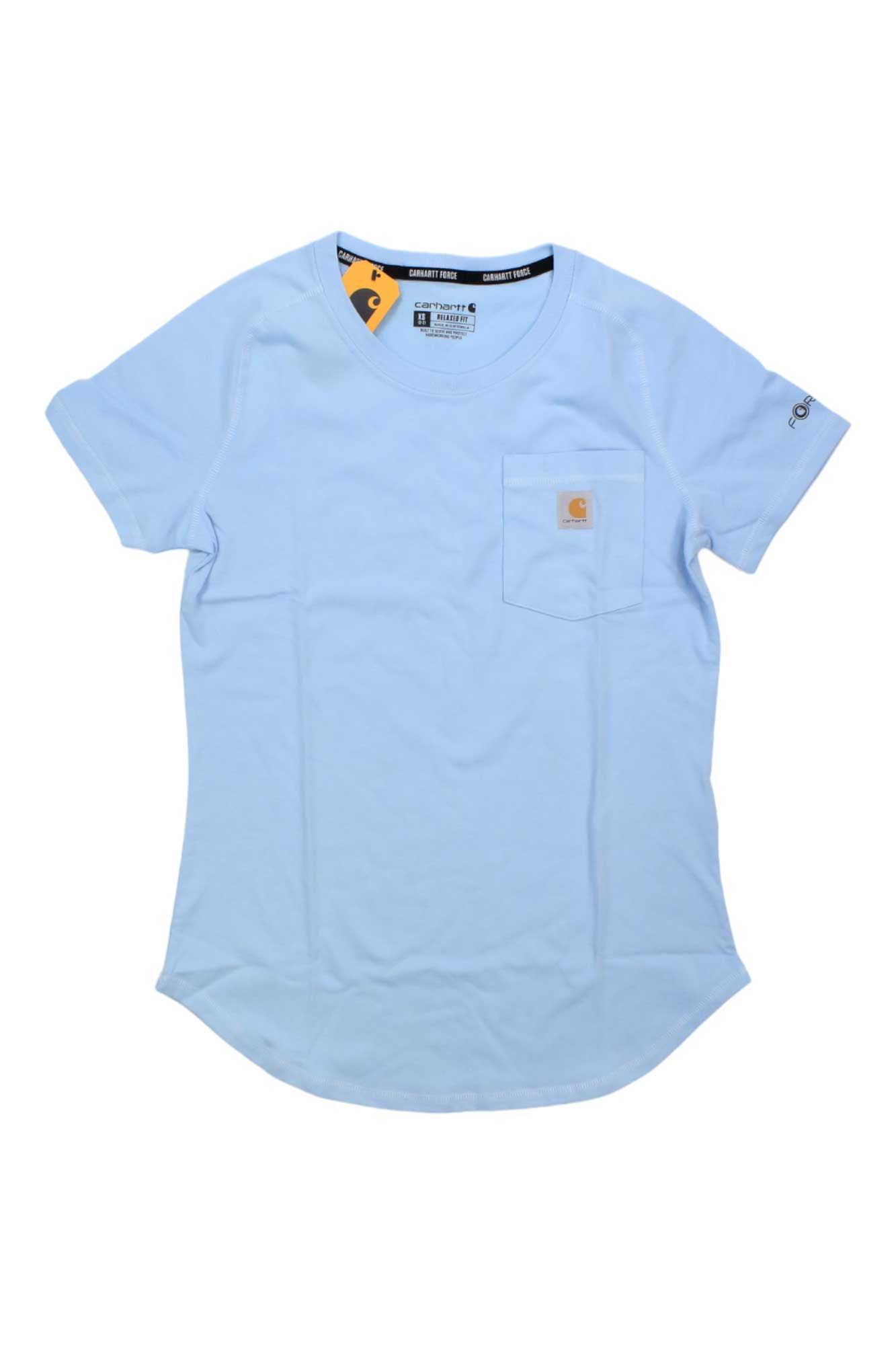 The Carhartt Womens Force Relaxed Fit Midweight T-Shirt in light blue features a round neckline, chest pocket with tan Carhartt logo, small Force logo on the left sleeve, and moisture-wicking fabric. Shirt shown laid flat on a white background.