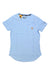 The Carhartt Womens Force Relaxed Fit Midweight T-Shirt in light blue features a round neckline, chest pocket with tan Carhartt logo, small Force logo on the left sleeve, and moisture-wicking fabric. Shirt shown laid flat on a white background.