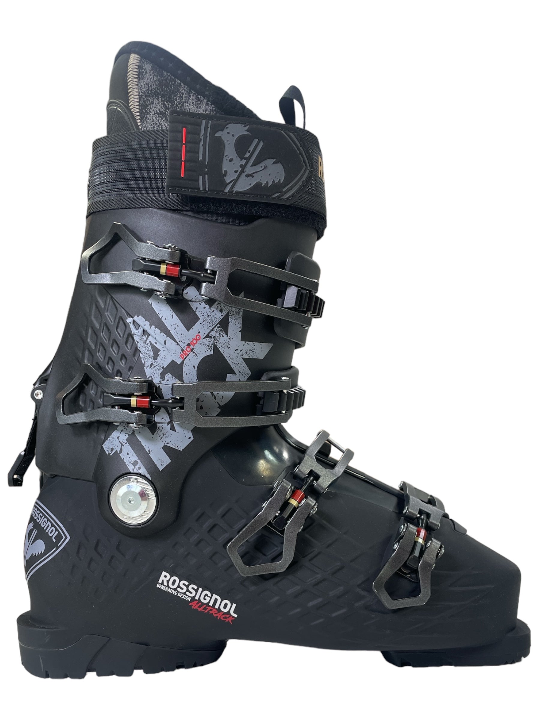 The Rossignol Alltrack Pro 100 Mens Ski Boot is black with multiple adjustable buckles, a textured finish, white graphics, and a top power strap, making it ideal for downhill skiing enthusiasts.