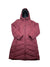 The Womens Montreaux Down Coat, a long maroon down coat with a hood, front zipper, and quilted design, offers warmth and style. This insulated coat is shown on a white background.