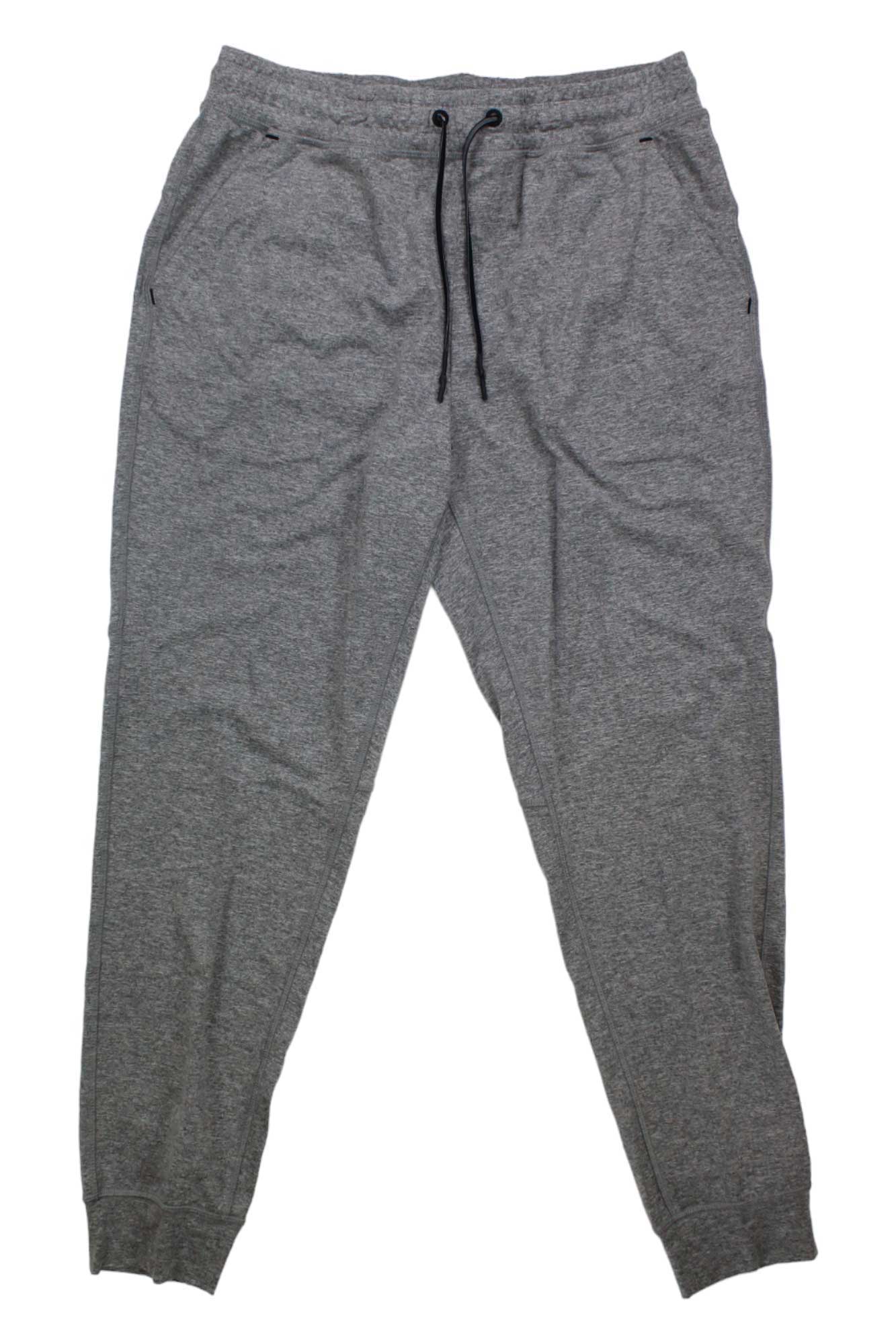 The Eddie Bauer Mens Reso Tech Sweat Jogger, eco-friendly gray joggers with an elastic waistband, black drawstring, side pockets, and fitted cuffs, is displayed on a white background.