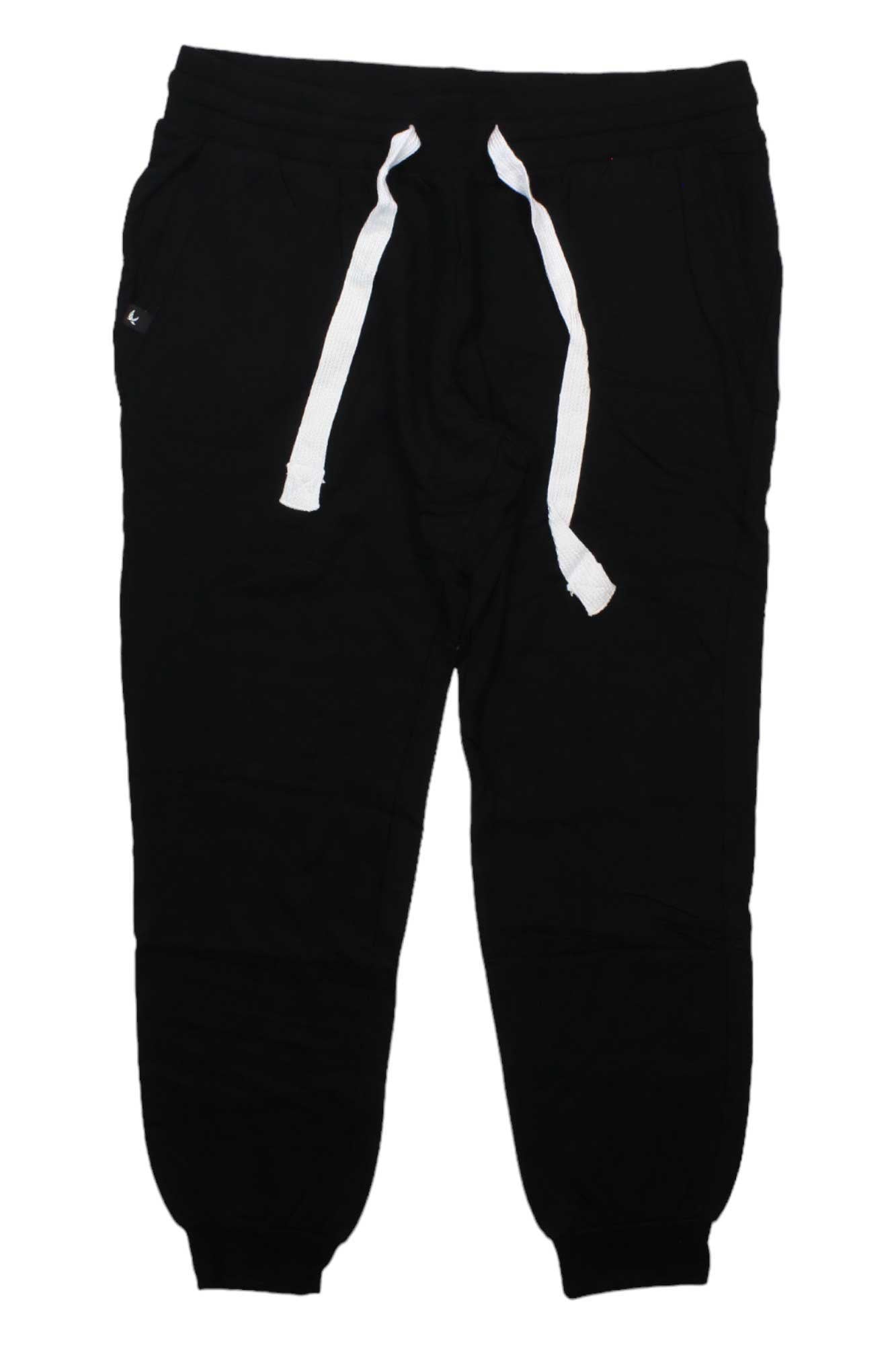 The Glyder Womens Halfway Jogger features an elastic waistband, white drawstrings, side pockets, and cuffed ankles. Shown laid flat on a white background. Ideal for running, fitness, or casual wear.