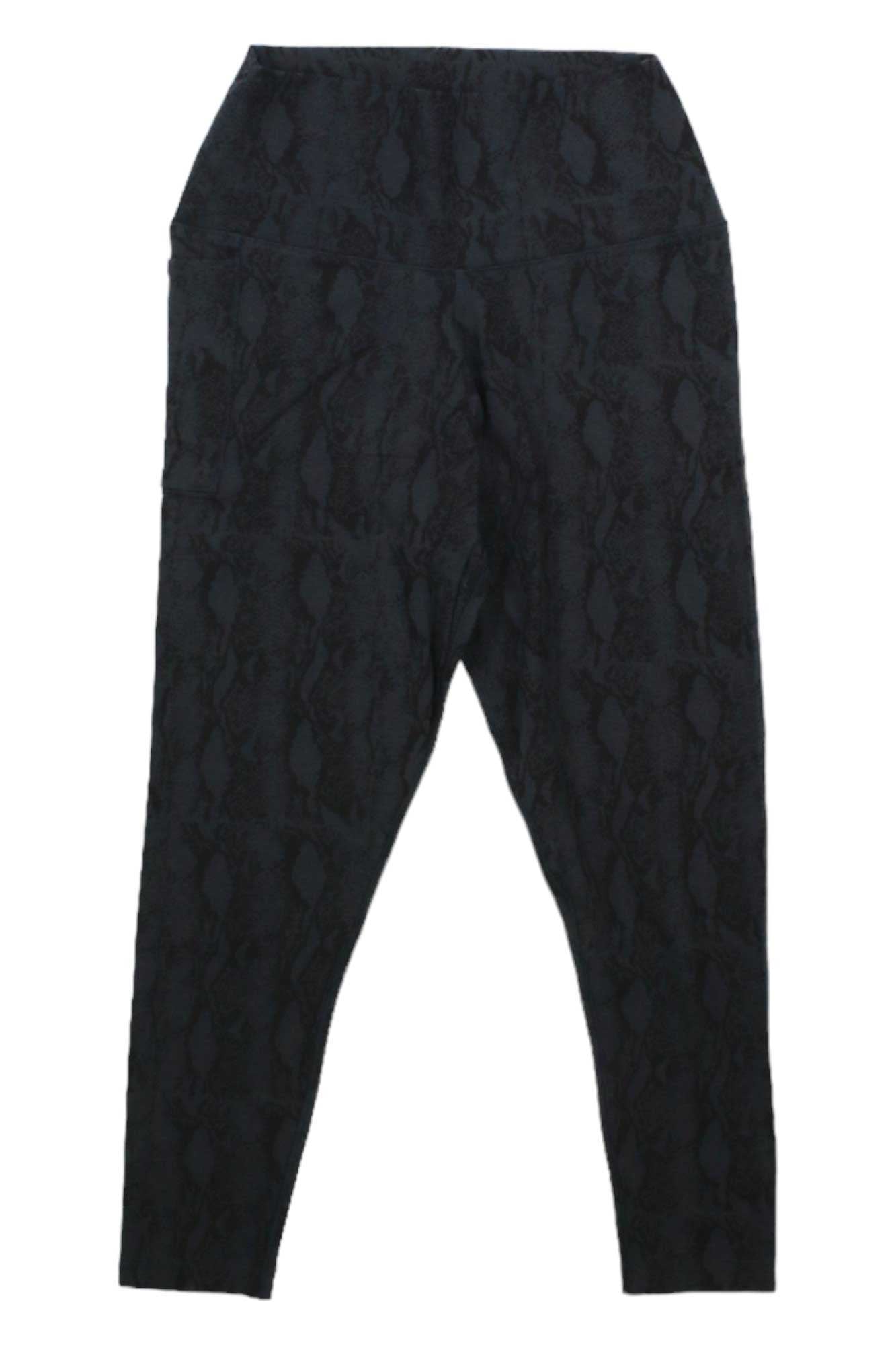 The Tasc Womens Allways 7/8 Legging - Printed is a black, high-waisted women's legging with a subtle printed design, shown laid flat on a white background.