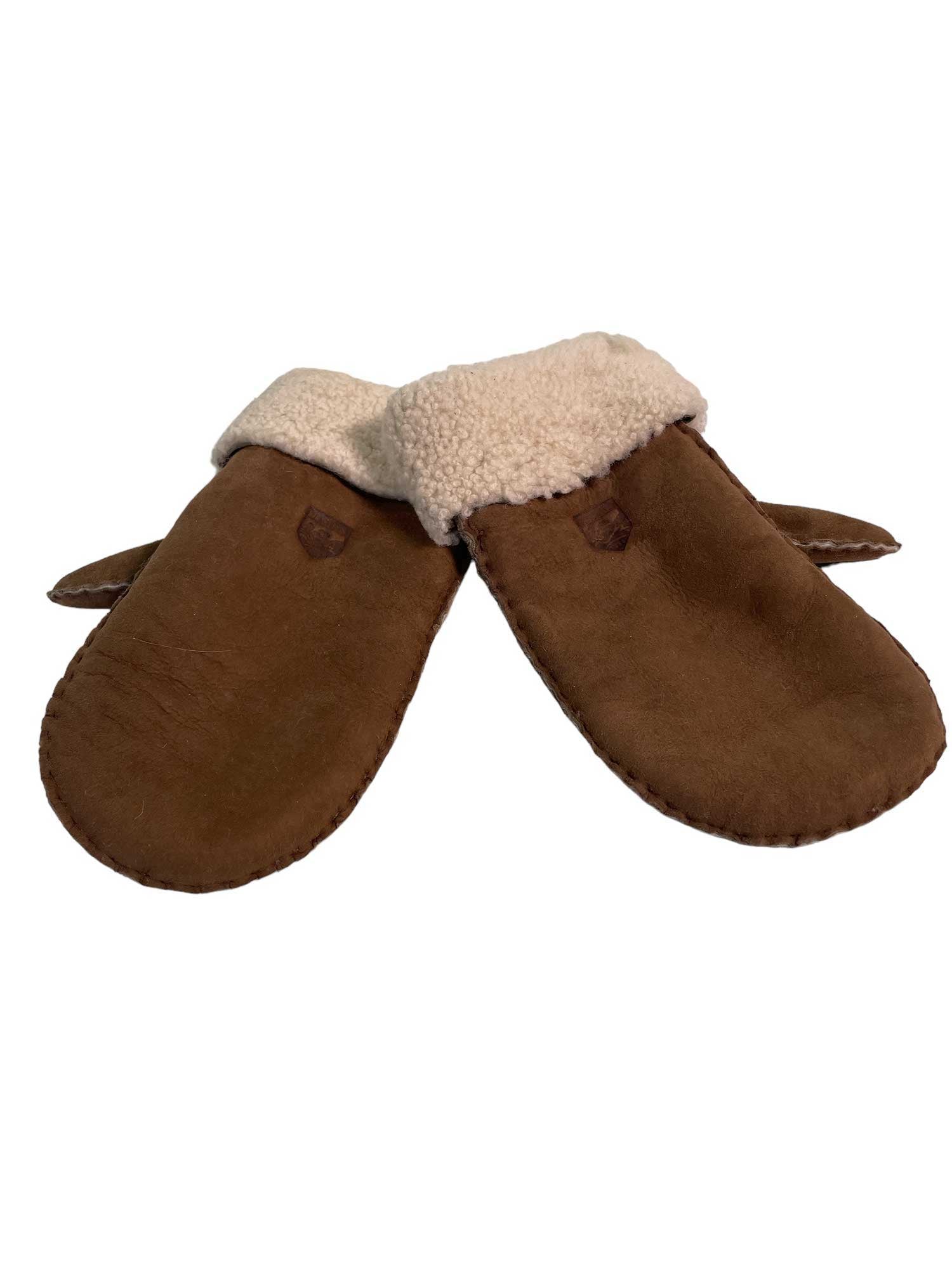 The Hestra Sheepskin Mitt features brown insulation, beige fleece cuffs, and playful ear-like flaps that resemble animal faces—ideal for keeping your hands warm and cozy during winter.