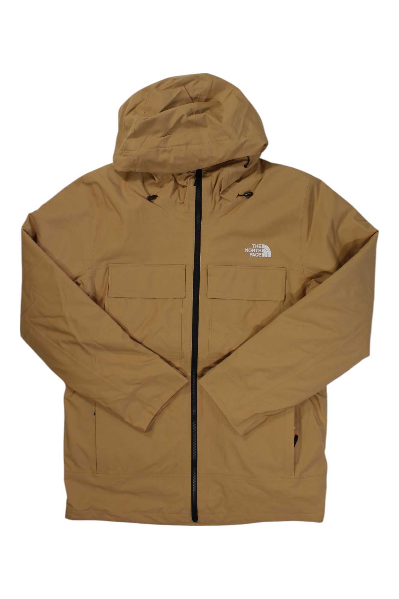 A tan The North Face Mens Fourbarrel Triclimate Jacket with a hood, front zipper, two chest pockets, and white logo on the left chest. The waterproof jacket is laid flat with sleeves extended.