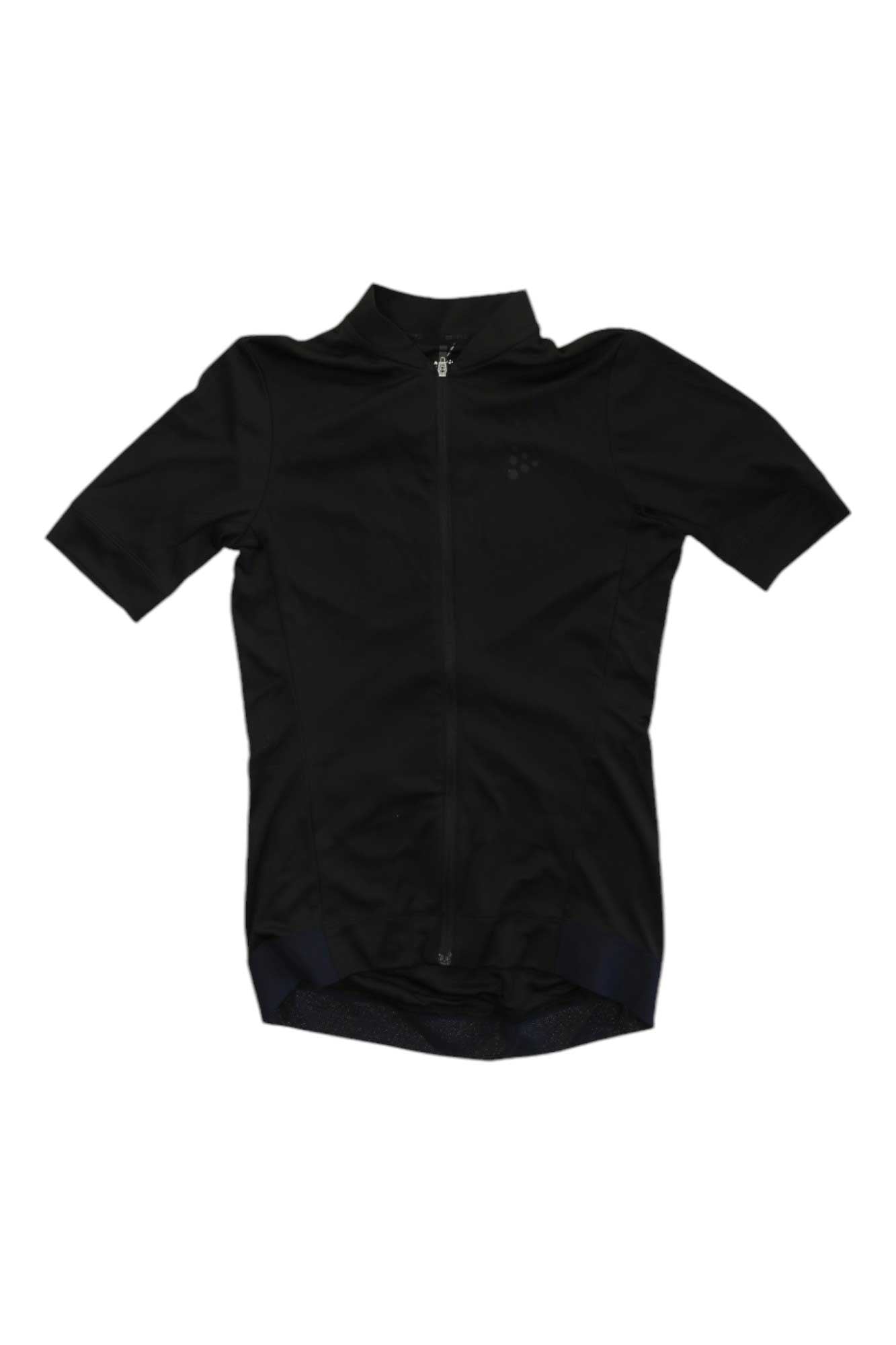 The Craft Sportswear Womens Essence Jersey is a high-performance black cycling top with moisture-wicking fabric, short sleeves, a full-length front zipper, high collar, and an extended back hem for comfort on every ride.