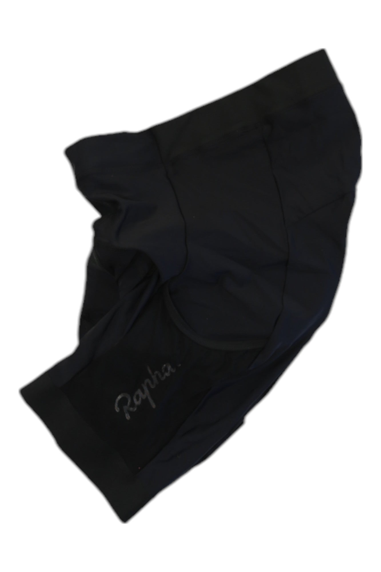 A pair of black Rapha Core Cargo Shorts with the Rapha logo on the left leg, laid flat on a white background.