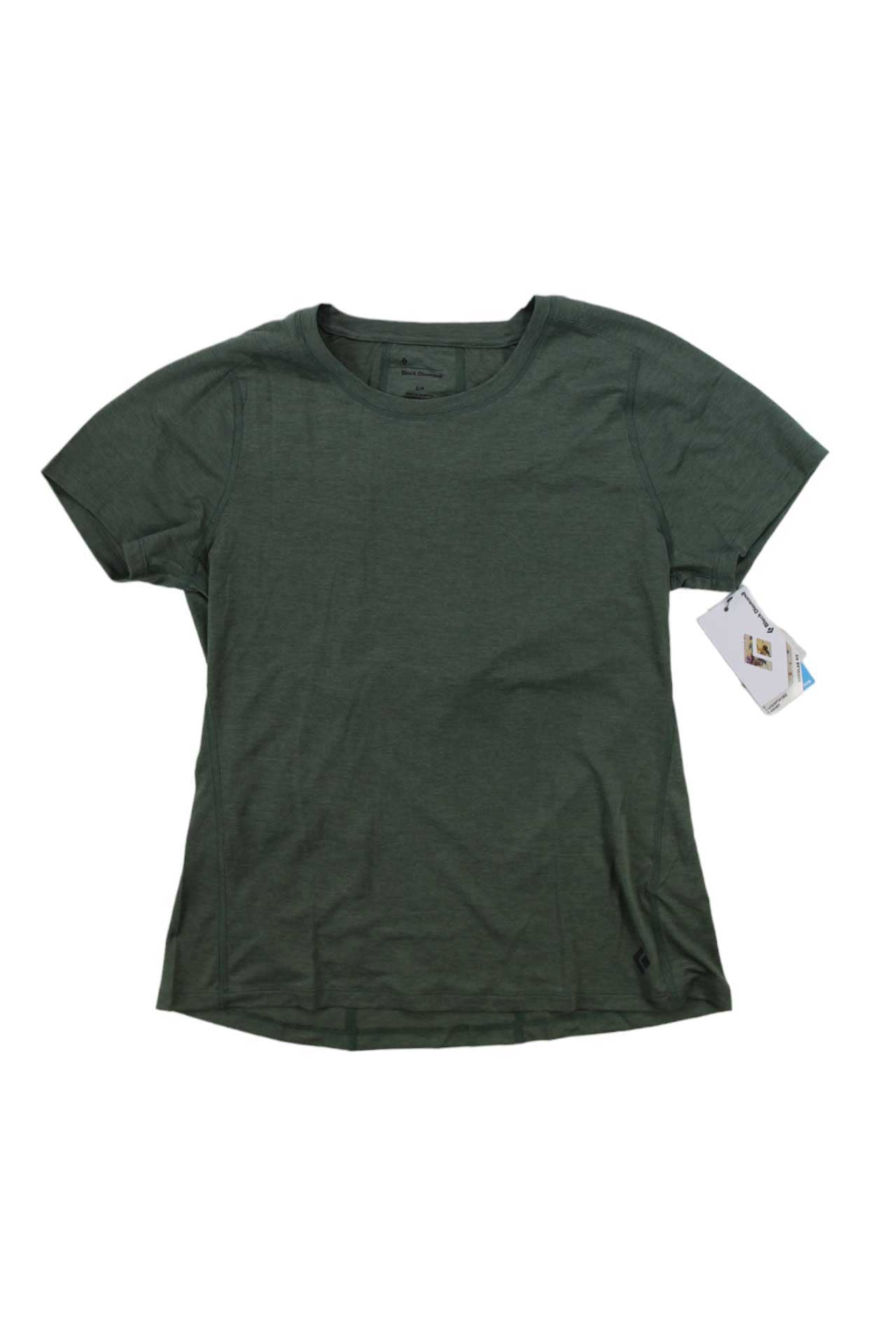 The Black Diamond Womens Lightwire Tech Tee, a plain, short-sleeved dark green moisture-wicking shirt, is shown laid flat with tags attached to the right sleeve.