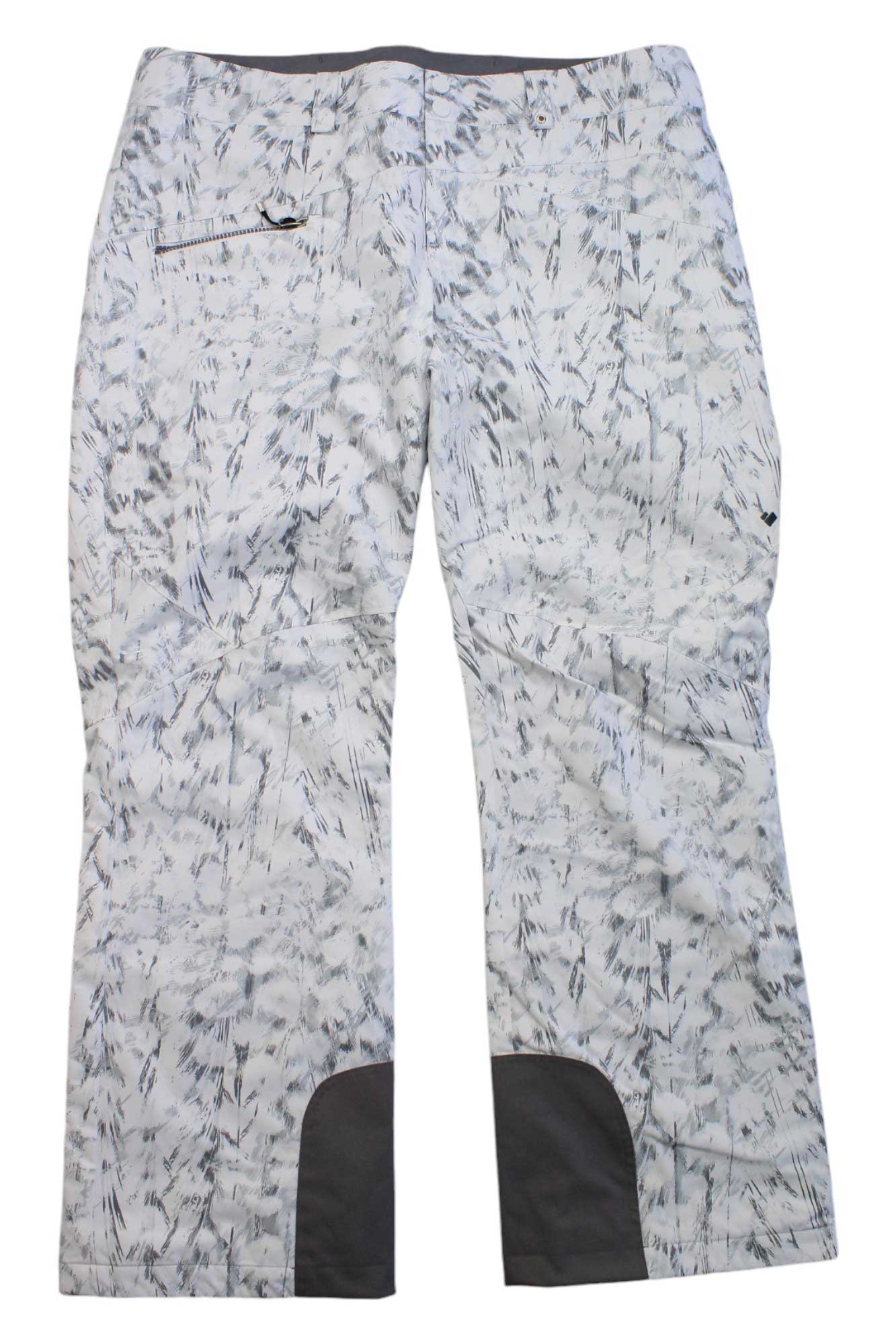 The Obermeyer Womens Malta Pant shown laid flat, back side up, features a white design with a gray abstract pattern, back zipper pocket, reinforced dark gray inner ankles, and offers insulated waterproof protection for skiing.