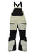 The Jones Womens MTN Surf Recycled Bib Pant is a beige and black waterproof bib with adjustable straps, zippered pockets, reinforced knees, side venting, and the Jones logo on the left thigh.
