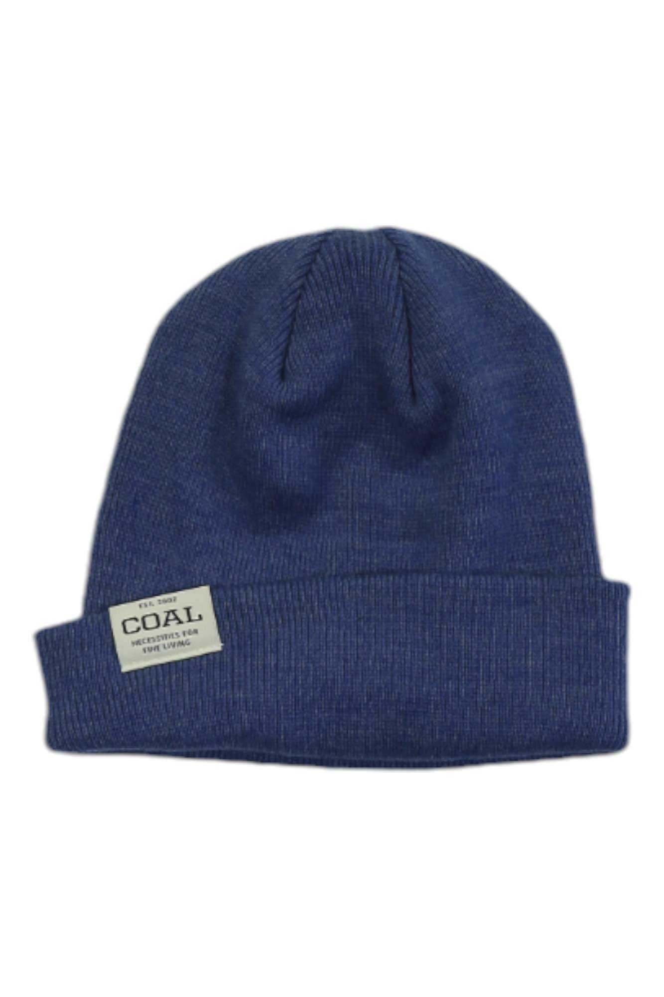 The Coal The Uniform Low Beanie is a blue ribbed knit beanie with a folded brim and a white rectangular “Coal” patch on the front. This unisex beanie is an ideal winter accessory for outdoor wear.