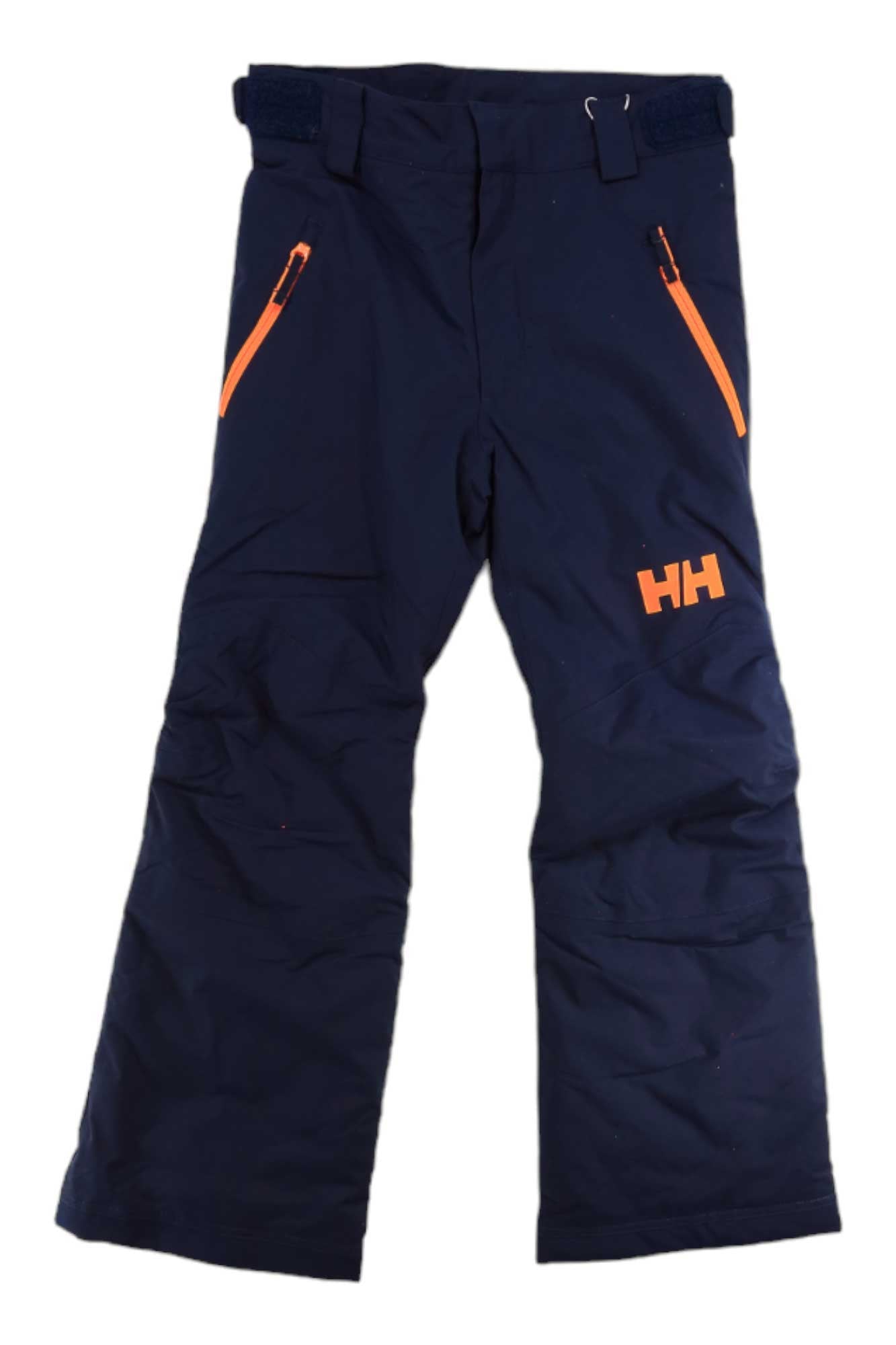 The Helly Hansen Juniors Legendary Pant in navy blue features orange zipper pockets, a logo on the left leg, waterproof insulation, and adjustable waist tabs—perfect ski pants for kids.