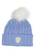Light blue ribbed knit beanie with white pom-pom and Helly Hansen crest patch