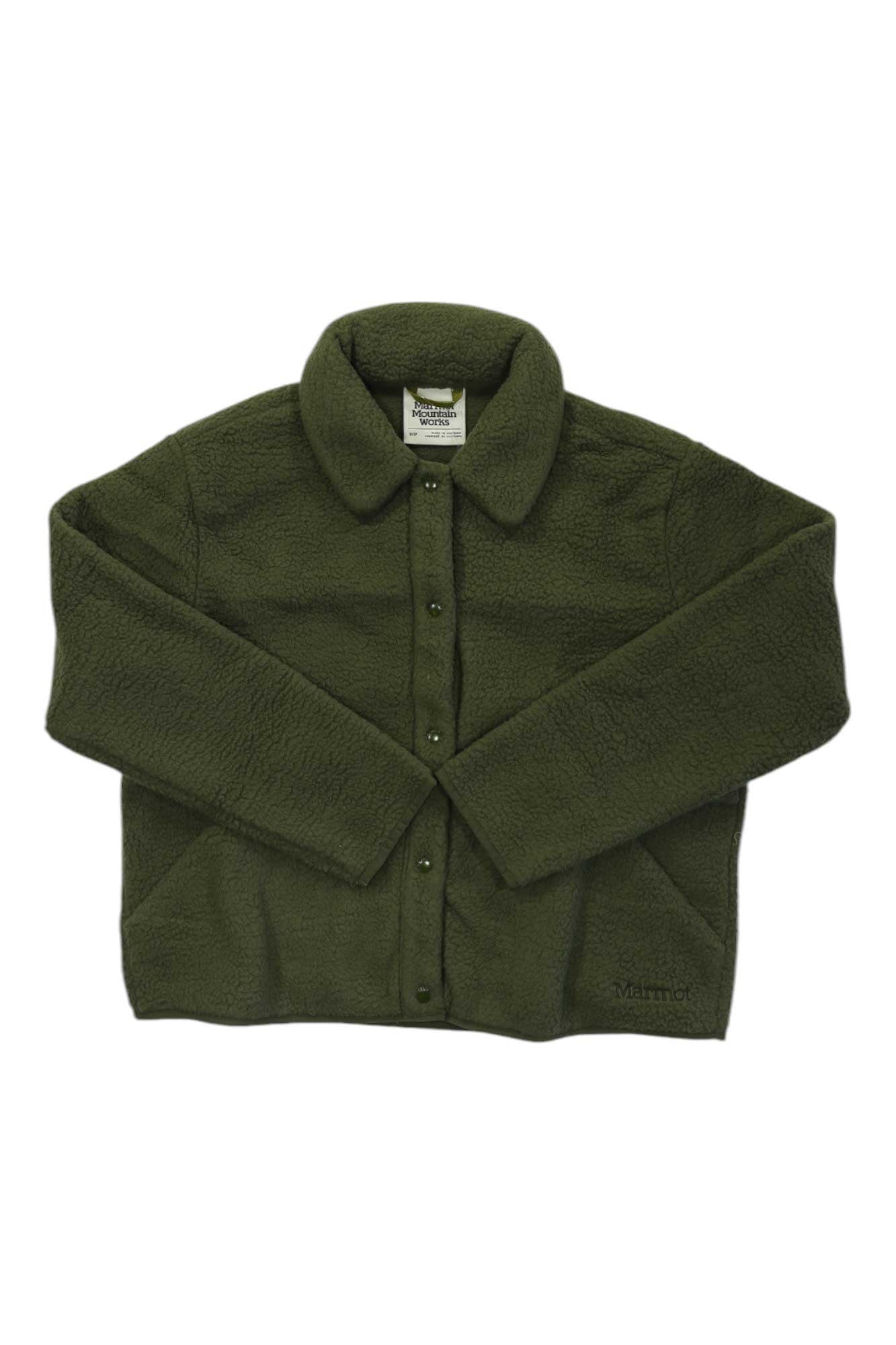 The Marmot Womens Aros Fleece Snap Jacket is a dark green sherpa fleece with long sleeves, a collar, snap button front, and a soft, textured look. The brand name Marmot is embroidered near the hem.