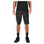 A person wearing a black t-shirt, Mons Royale Virage Men's Bike Shorts in Black (XL), black socks, and black sneakers stands against a plain white background.
