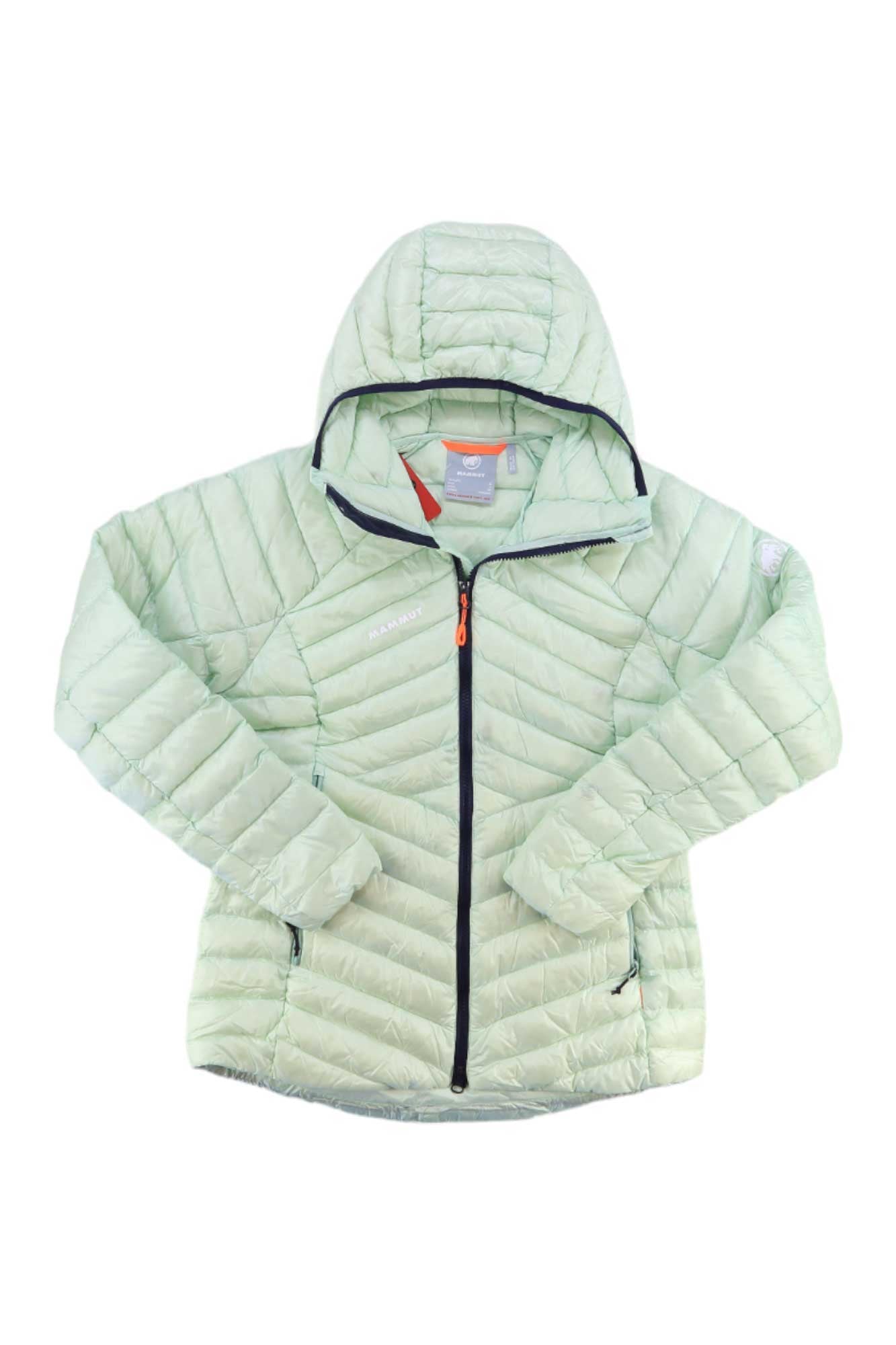 The Mammut Womens Broad Peak IN Hooded Jacket is a lightweight, insulated light green jacket with a quilted hood, front zipper, two zippered pockets, diagonal stitching, black-trimmed zippers, and small logos on the chest and upper sleeve.