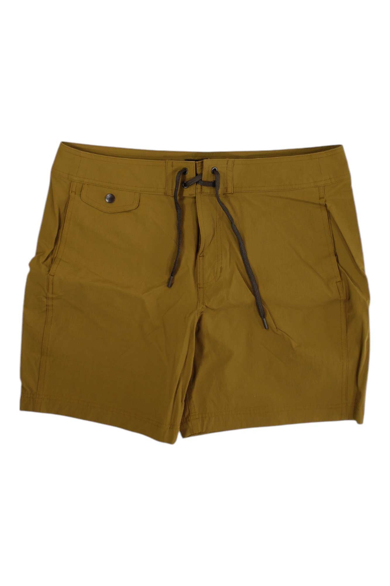 The Filson Mens Glacier Bay Trunk in mustard yellow features a buttoned front pocket and side pockets, shown laid flat on a white background.