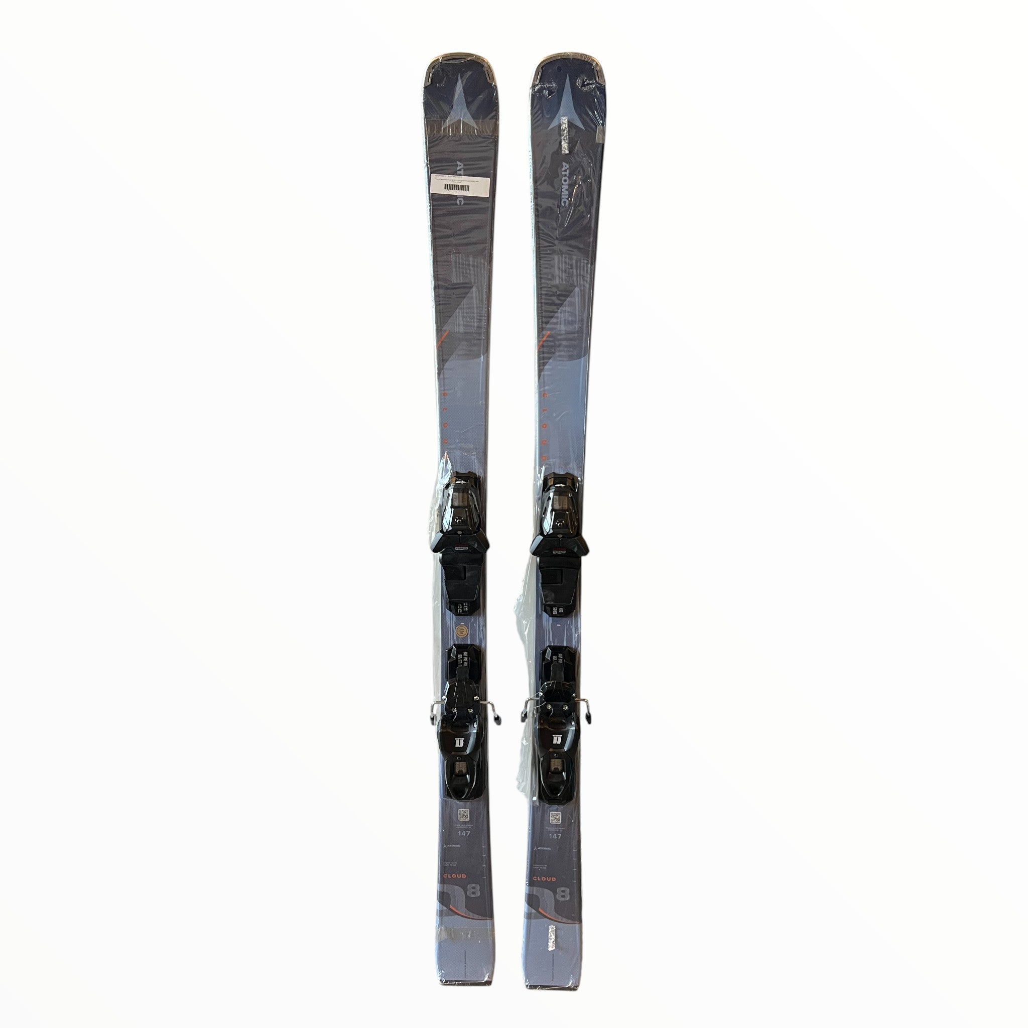 A pair of Atomic Women's Cloud Q8 all-mountain skis with M10 GW Bindings in black and gray, shown standing upright side by side on a plain white background.