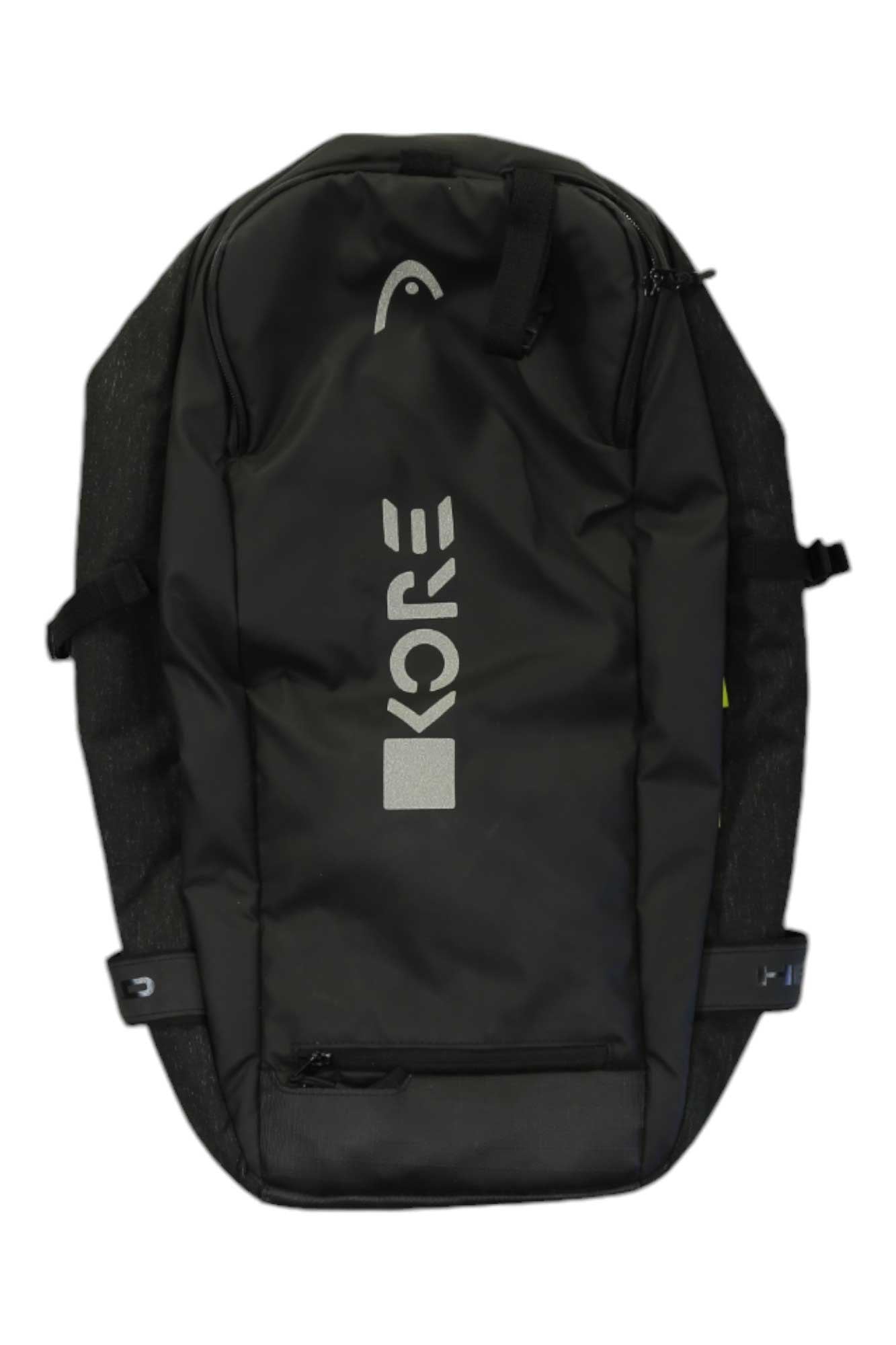 The Kore Backpack is a black hiking bag with a top zipper, side straps, and a large front pocket. The white HEAD logo and vertical text are printed on the front—an ideal outdoor companion for your next adventure.