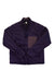 A dark purple Under Armour Womens Latitude Reversible Full Zip Jacket with long sleeves, a collar, and front zipper. It has a light purple left chest pocket and is laid flat with crossed sleeves.