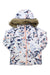 The Roxy Girls American Pie Jacket is a white insulated winter coat with a pastel blue, pink, and peach floral pattern, faux fur hood trim, and a light pink front zipper.