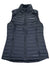 The Womens White Out Vest by Columbia is a black, sleeveless insulated vest with horizontal quilting, high collar, zippered front and pockets, ideal for hiking. The Columbia logo appears on the left chest.