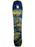 The Jones Youth Flagship Snowboard features a colorful mountain landscape with winding roads, trees, cabins, snowy peaks under a starry sky, and visible price tags near the top.
