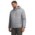 A man smiles and looks to the side wearing The North Face Men's Big Thermoball Eco 2.0 Hoodie in light gray, featuring a square quilted design made from recycled nylon, paired with casual brown pants.