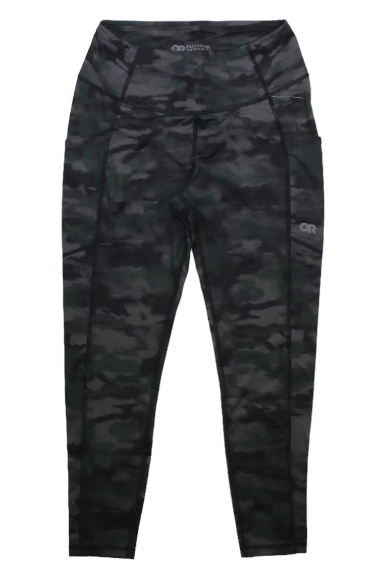 The Outdoor Research Women's Melody 7/8 Legging features a black and dark green camo pattern, high waist, flat seams, and moisture-wicking fabric. The logo appears on the waistband and left thigh. Shown laid flat on a white background.