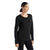 A woman with dark hair in a low ponytail wears the Icebreaker Womens Sphere II LS Tee and black leggings, smiling while looking to the side against a white background. The tee's moisture-wicking fabric ensures all-day comfort.