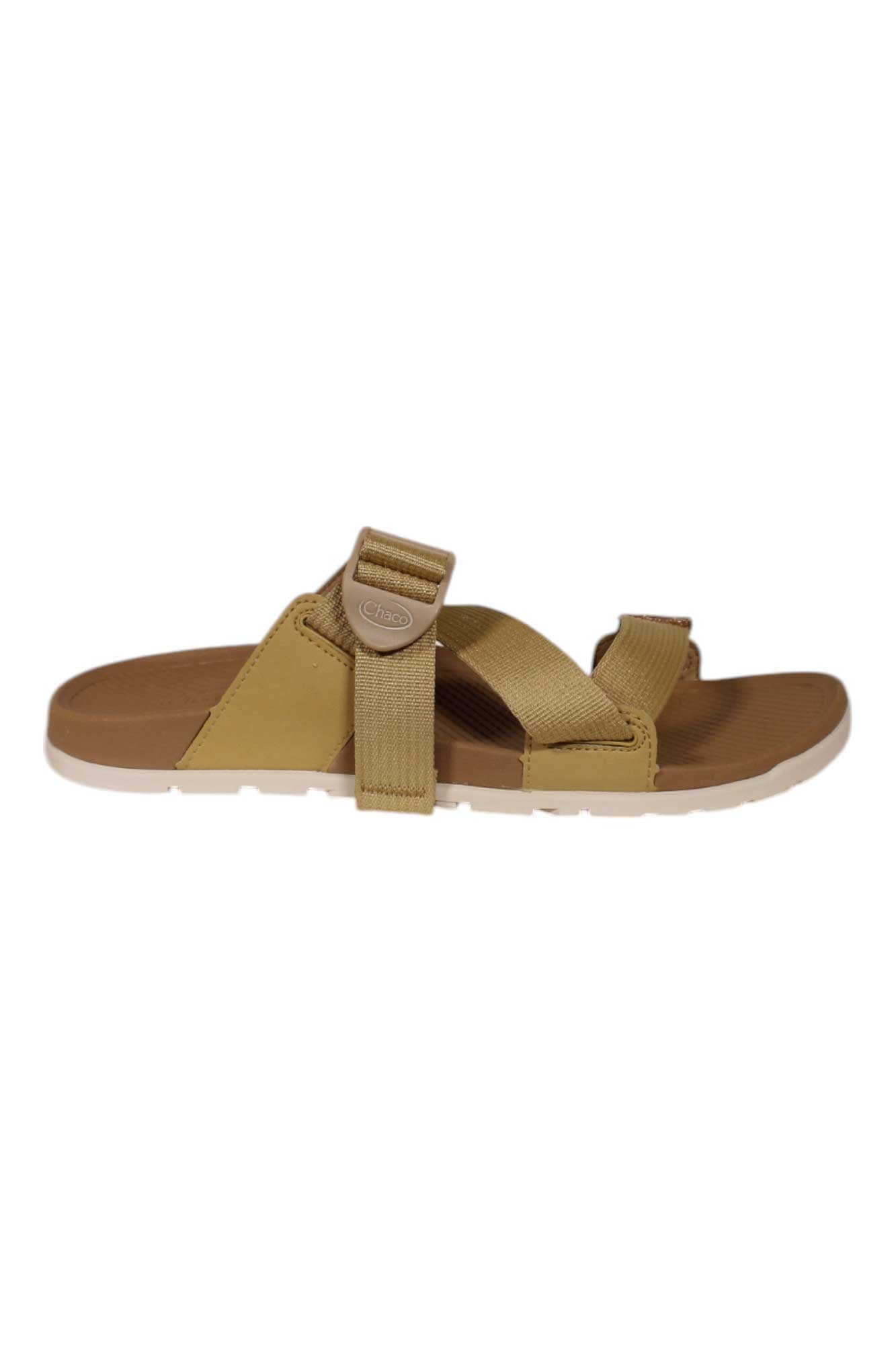 The Chaco Womens Lowdown Slide is a tan sandal with a brown footbed, adjustable fabric straps, and a white sole—an ideal vegan slip-on for everyday comfort, shown from the side against a white background.