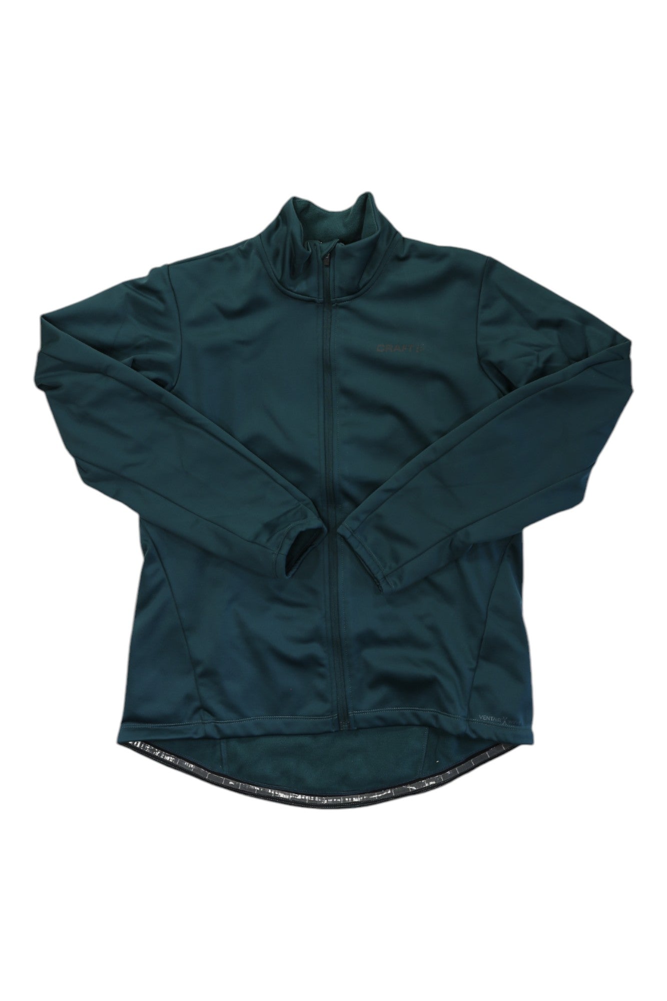 The Craft Sportswear Womens Core Ideal 2.0 Jacket is a dark green, long-sleeved cycling jacket for women with a stand-up collar, a slightly longer back hem, minimal visible branding, and is displayed flat on a white background.