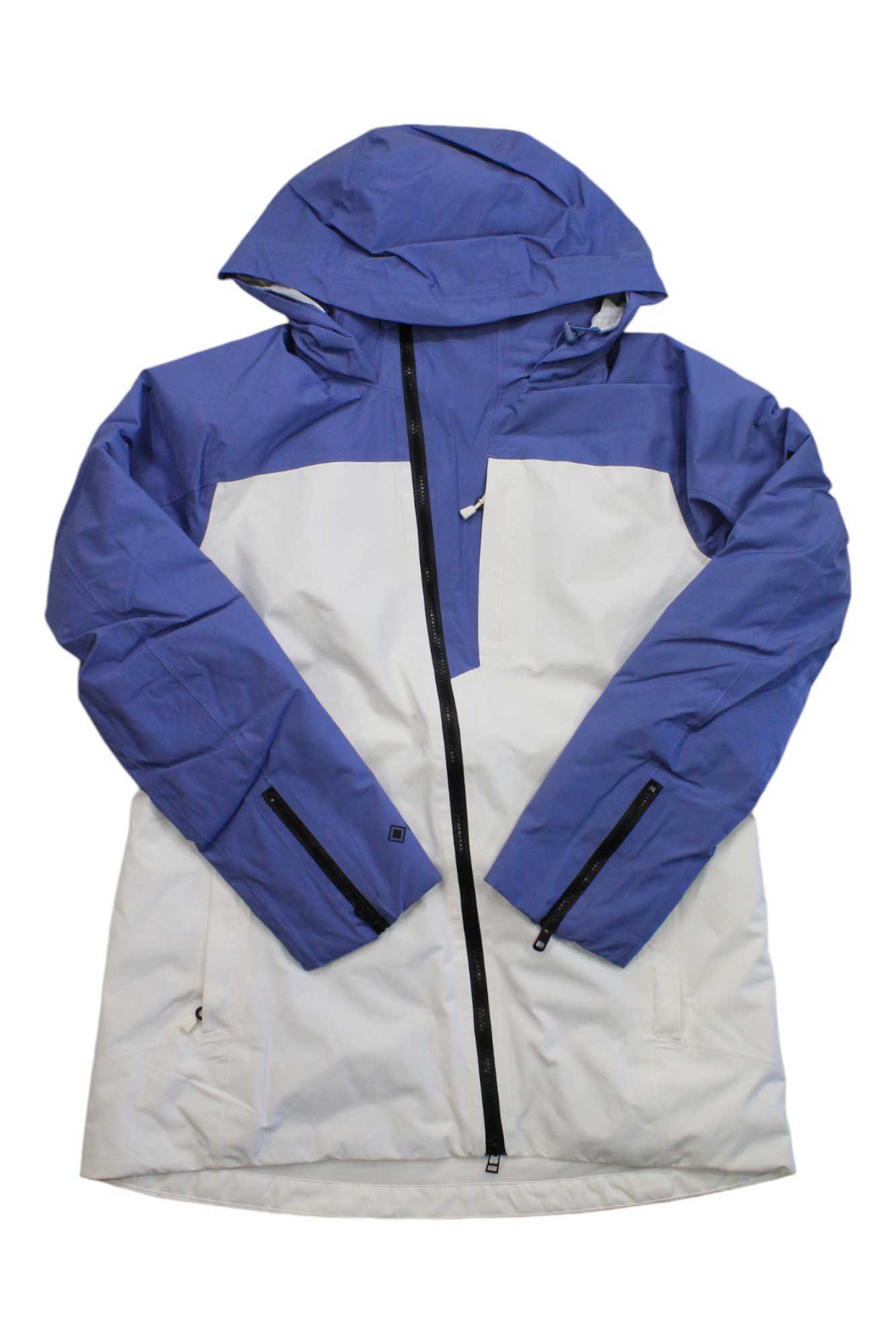 The Burton Womens GTX Pillowline Jacket is a two-tone winter jacket with a hood, blue upper and sleeves, a white lower section, ThermacoreECO insulation, waterproof design, black front zipper, and zippered sleeve and side pockets.