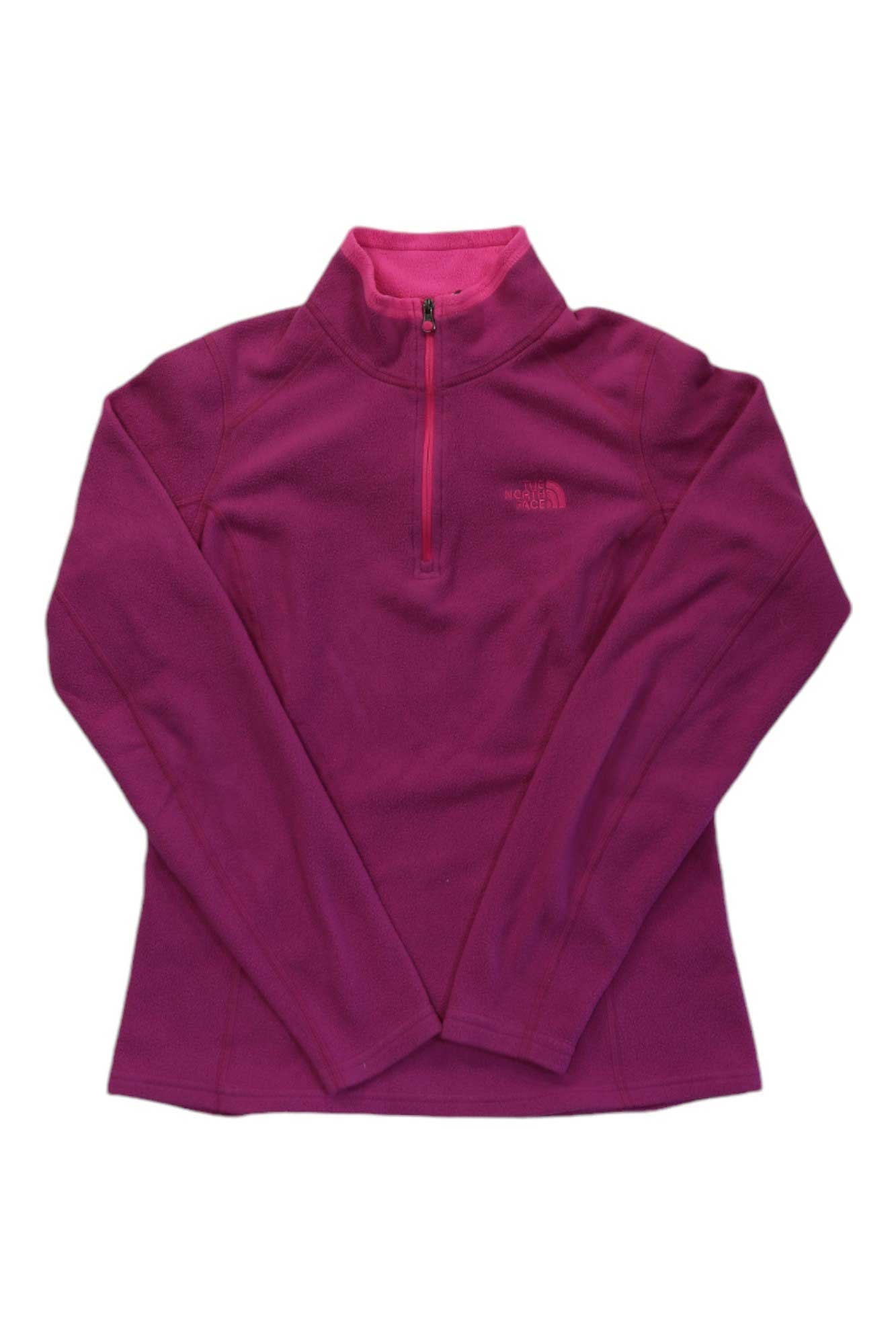 A fuchsia pink North Face Glacier 1/4 Zip Fleece for women with long sleeves, stand collar, and left chest logo is shown laid flat on a white background.