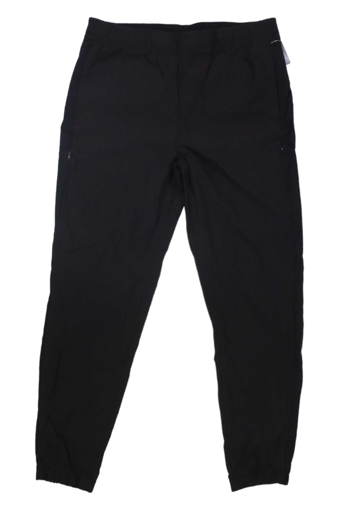 The Eddie Bauer First Ascent Women's Guide Jogger in plain black features UPF 50+ protection, an elastic waistband and cuffs, shown flat on a white background.