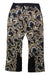 The Spyder Womens Winner Pant features a bold abstract floral print in brown, beige, black, and white, with black side panels, front zip pockets, and PrimaLoft insulation—perfect for warmth and style on the slopes.