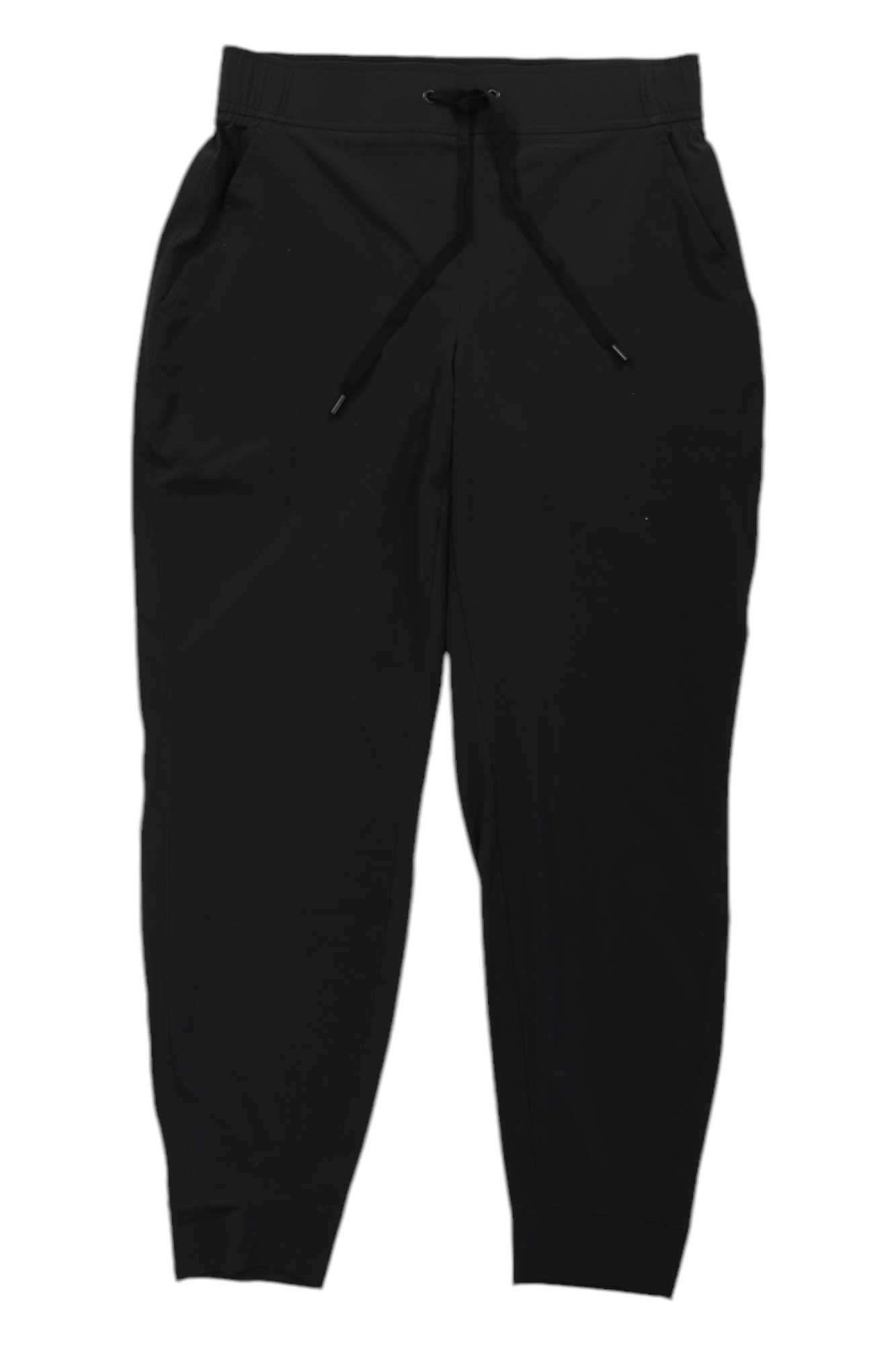 The Eddie Bauer Travex Women's Departure Jogger features an elastic waistband, side pockets, and a black drawstring. Laid flat on a white background, these joggers are made from moisture-wicking fabric for all-day comfort.