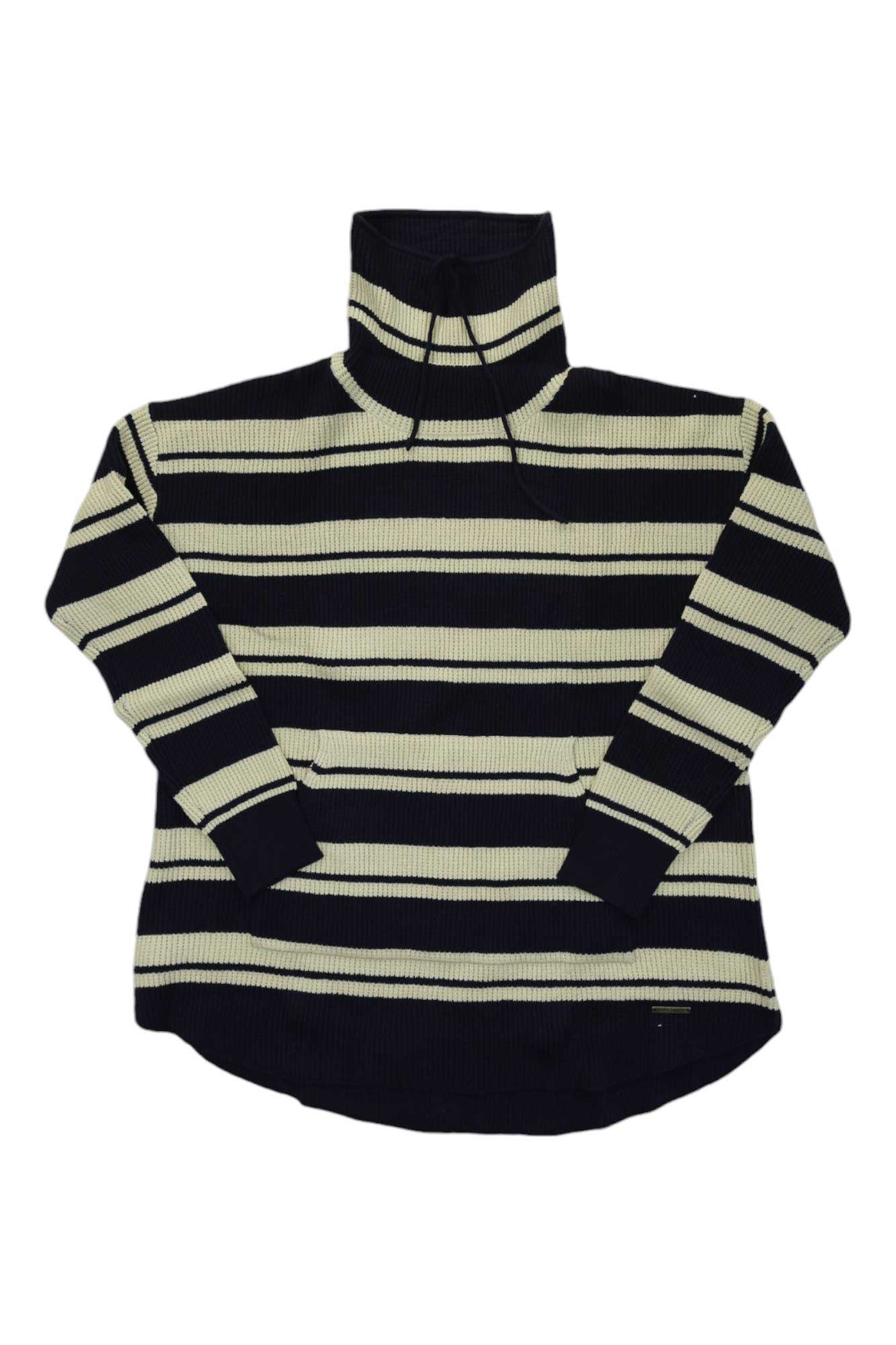 The Carve Designs Women's Rockvale Sweater features black and light beige horizontal stripes, a long-sleeve turtleneck with a drawstring, and a relaxed fit—ideal for travel or everyday wear.
