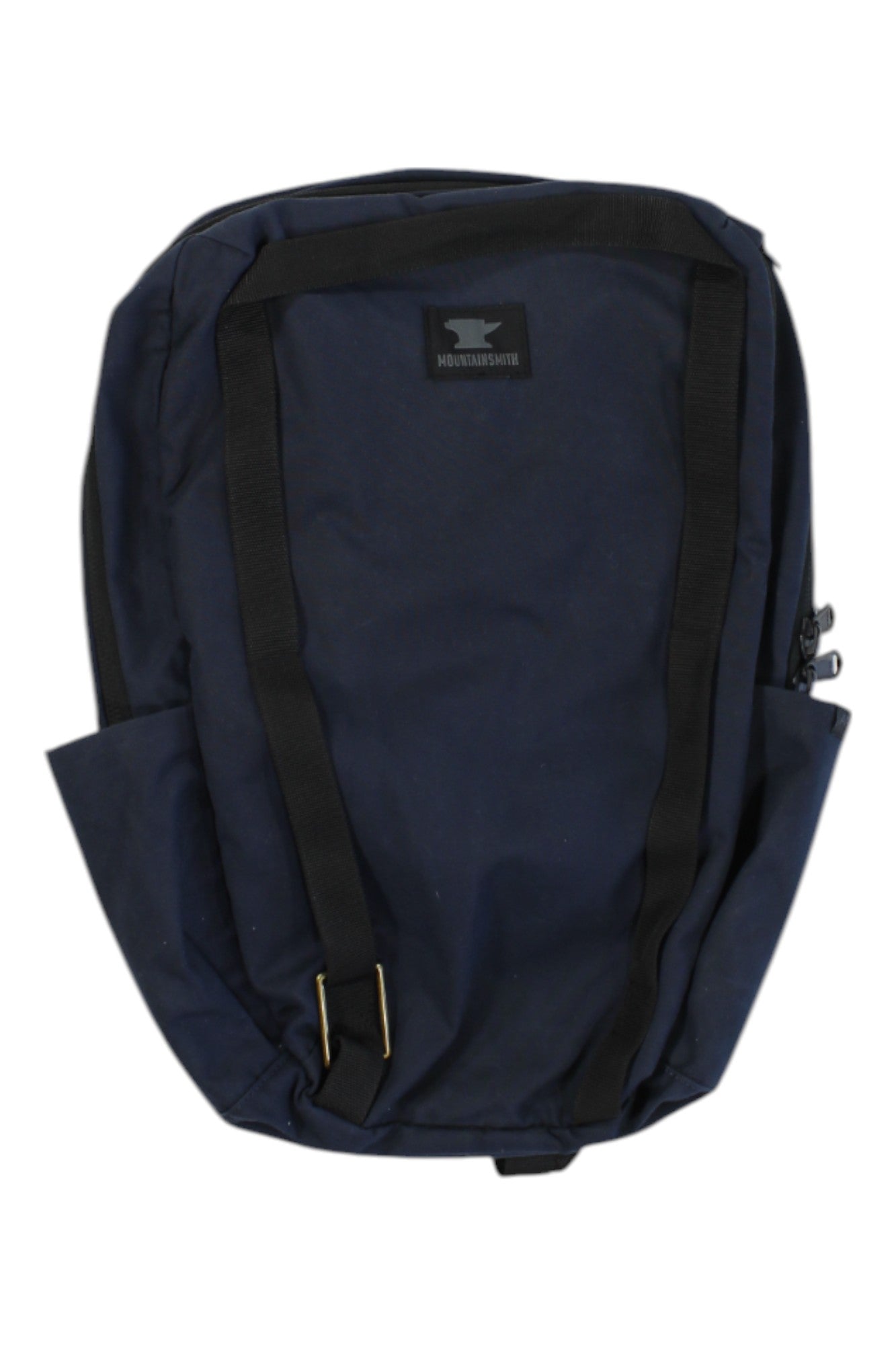 The Mountainsmith Amble 14L Pack is a navy backpack with black shoulder straps, a front pocket, side expansion pockets, and a small patch label near the top. It has a simple, unadorned design and is shown against a white background.