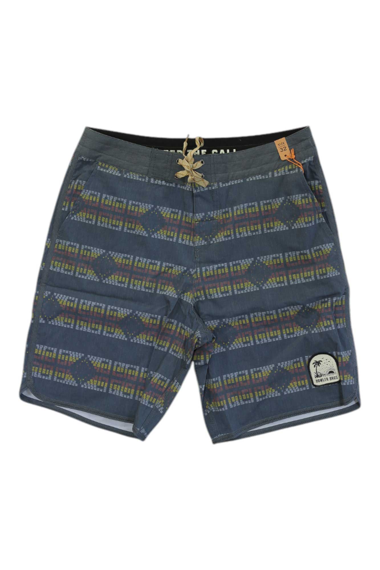 The Howler Brothers Mens Bruja Boardshort features a blue geometric pattern, drawstring waistband, side pockets, and a palm tree patch on the front left leg—a classic design for men's boardshorts.