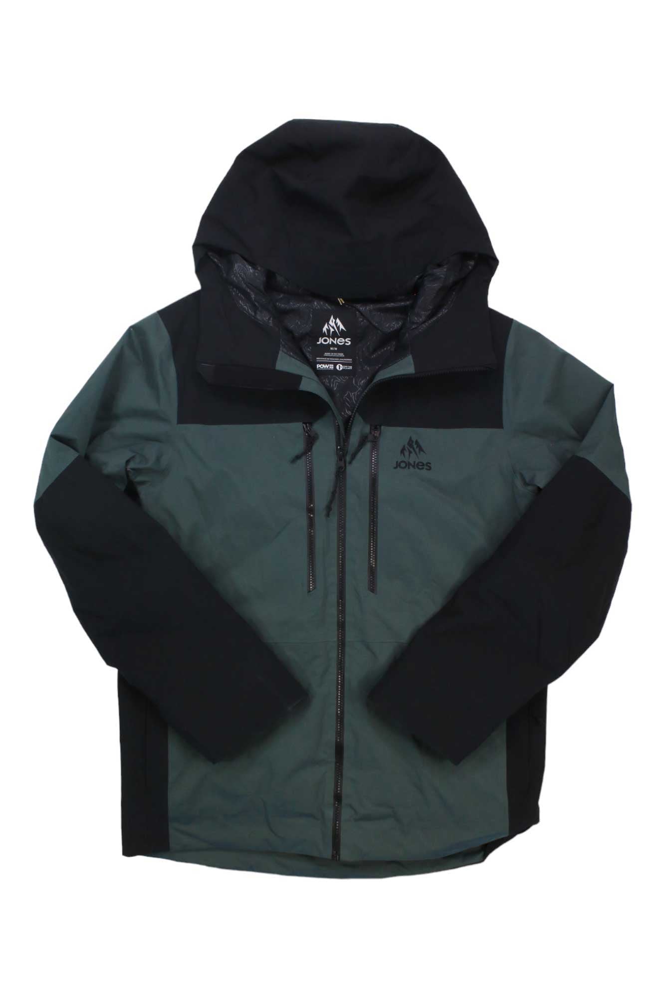 The Jones Mens MTN Surf Recycled Jacket is a two-tone, eco-friendly waterproof jacket featuring dark green with black sleeves, shoulders, and hood, a front zipper, two vertical chest pockets, and a subtle Jones logo on the left chest.
