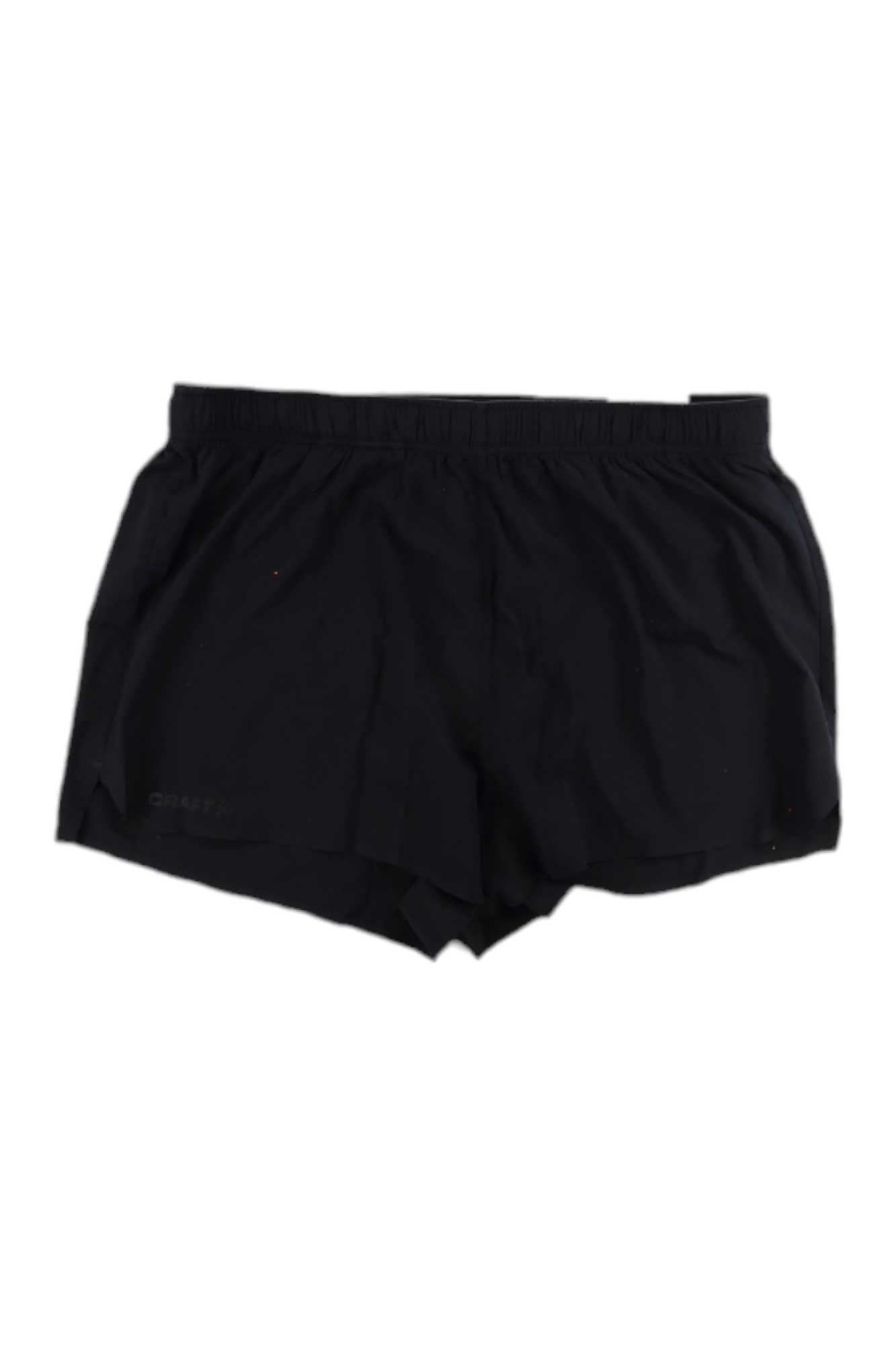 The Craft Sportswear Men's Adv Essence 2 Inch Stretch Short in black, featuring an elastic waistband, is shown laid flat on a white background.