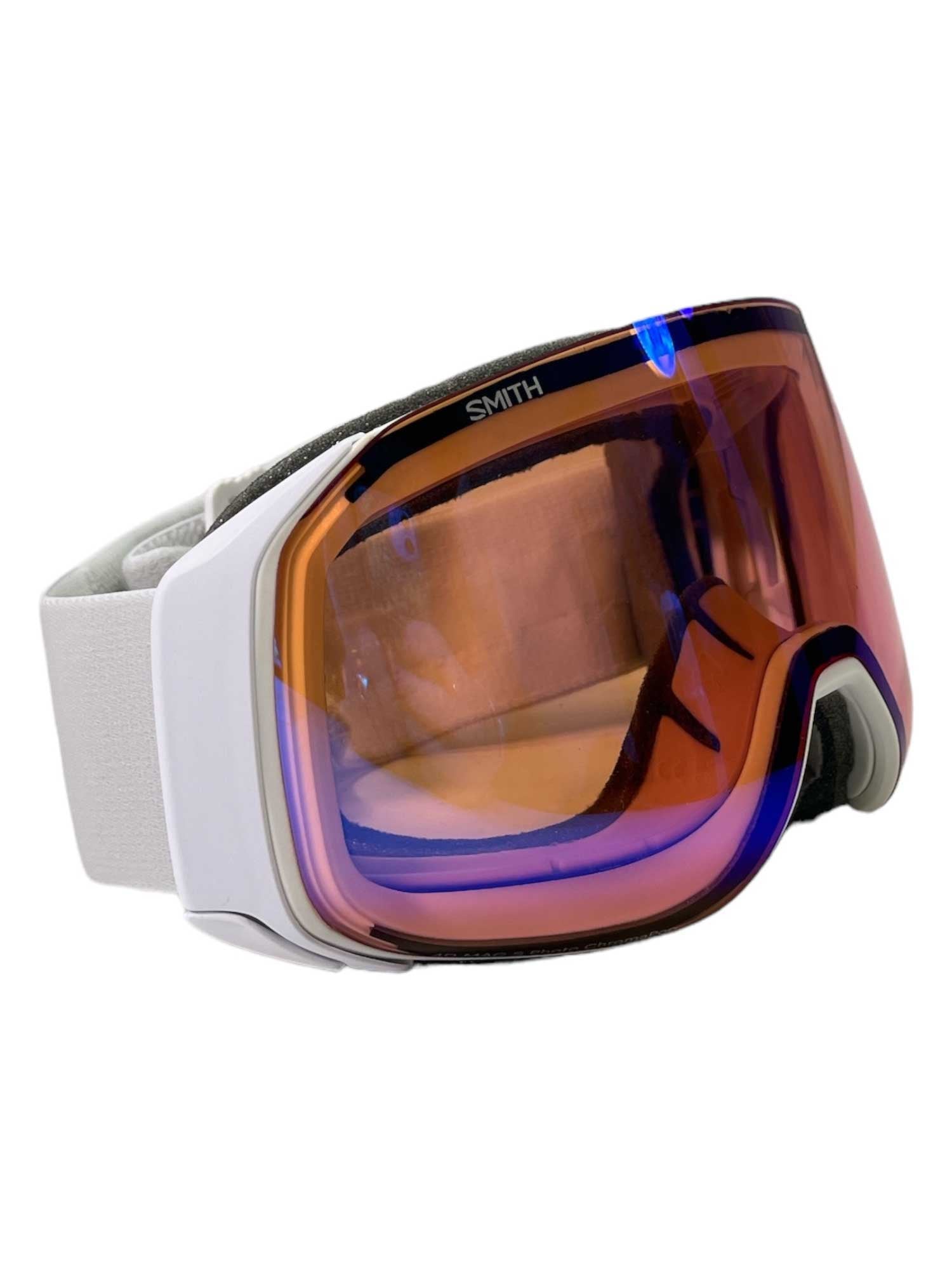 The Smith 4D Mag S Snow Goggle features a white frame, wide white strap, and orange reflective ChromaPop lenses for enhanced clarity and reliable anti-fog performance on the slopes.