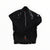 The Assos Mens RS Sturmprinz Jacket is shown in black with a glossy zipper trim, small shoulder logo patch, and orange inner accents, lying flat on a white background. This windproof cycling jacket combines style and performance.